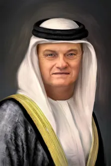 Мужской портрет под масло. На портрете изображён мужчина в традиционной арабской одежде: белоснежный гутра, закреплённый чёрным агалем, и тёмная кандура с золотой отделкой на плечах. Его лицо выражает спокойствие и уверенность, взгляд направлен прямо на зрителя на фоне приглушённого серого фона. Художник: Анастасия 