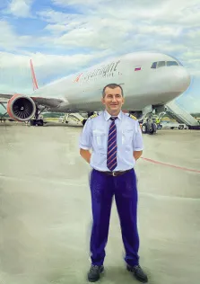 Портрет пилота на фоне лайнера на взлетной полосе аэропорта в Самаре