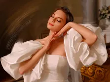 Портрет девушки в белом дизайнерском платье на нейтральном фоне выполнен Под масло, художник Софья 